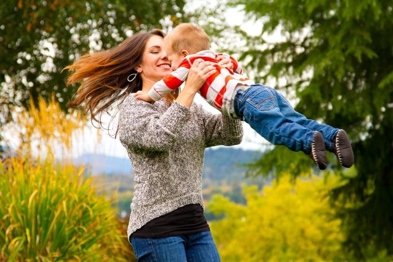 Bigstock Woman And Child Spinning 42879841