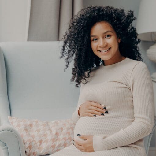 Beautiful Pregnant African Woman Enjoying Pregnancy, Spending Time At Home